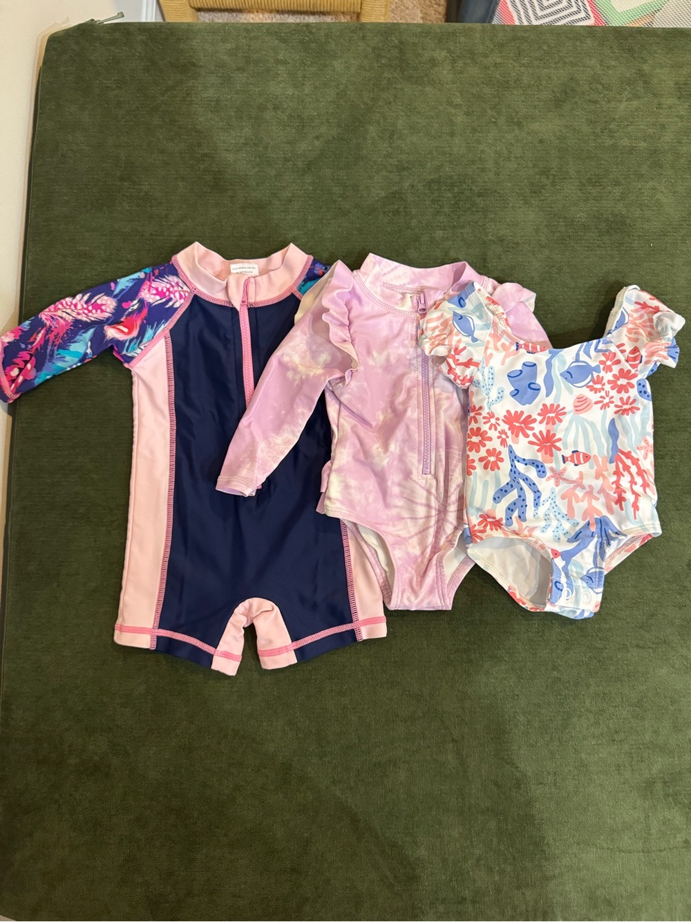 Set of three girl’s one piece swimsuits
